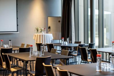 tables in meeting room at scandic spectrum in copenhagen