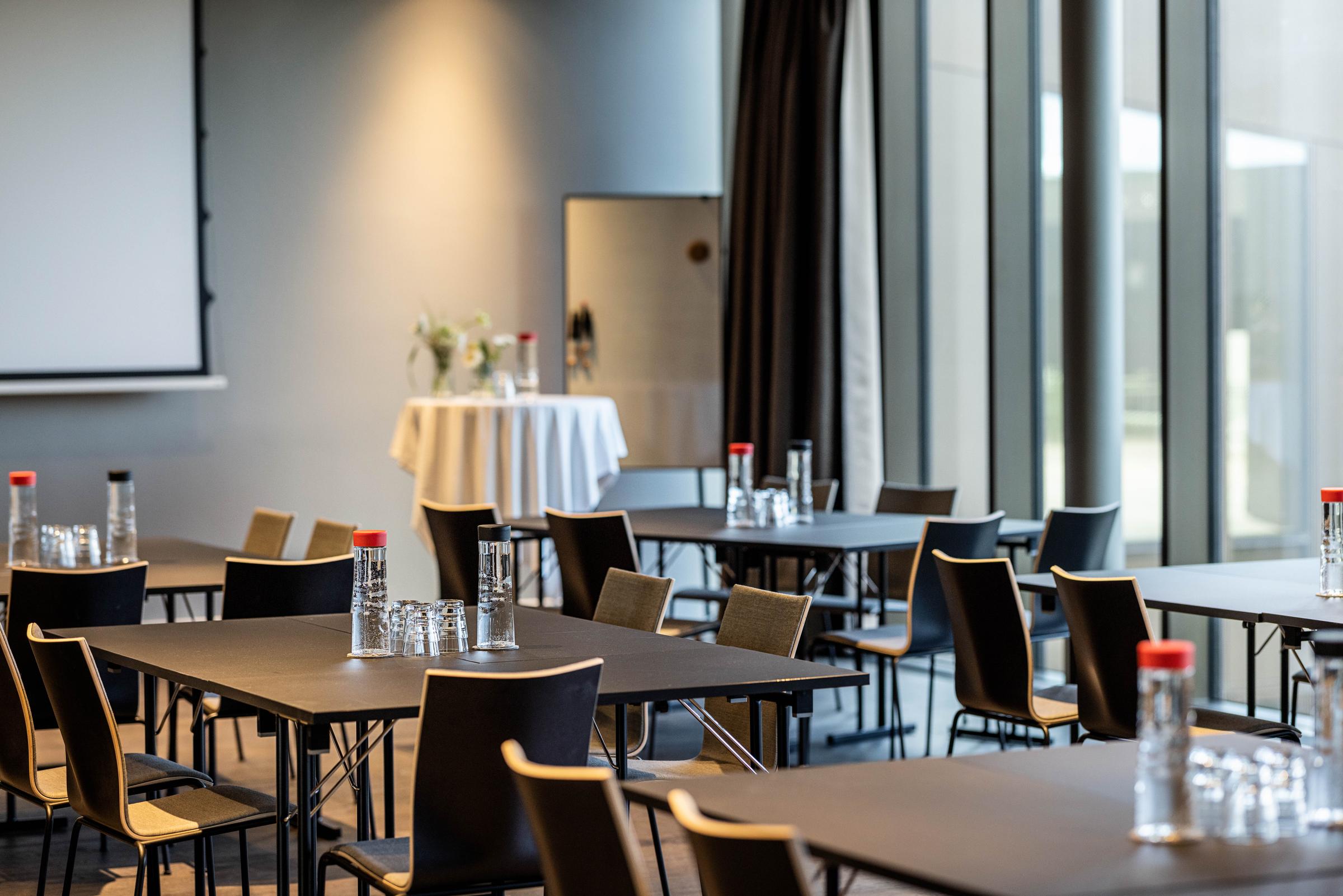 tables in meeting room at scandic spectrum in copenhagen