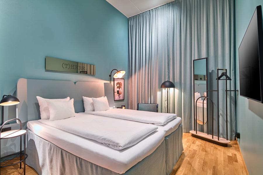 bed in standard cabin room at scandic göteborg central