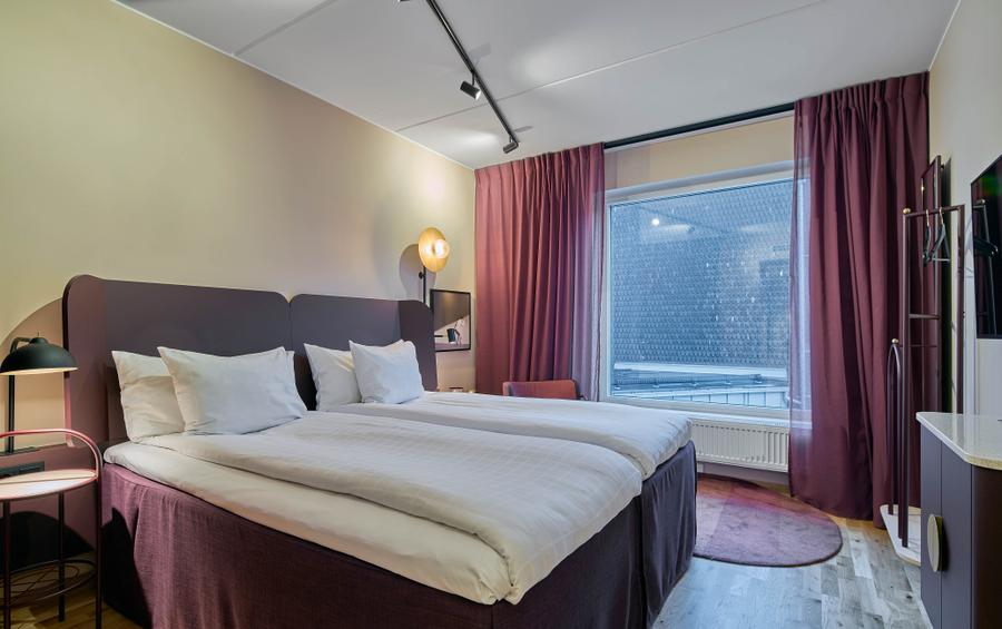 bed in standard room at scandic kiruna