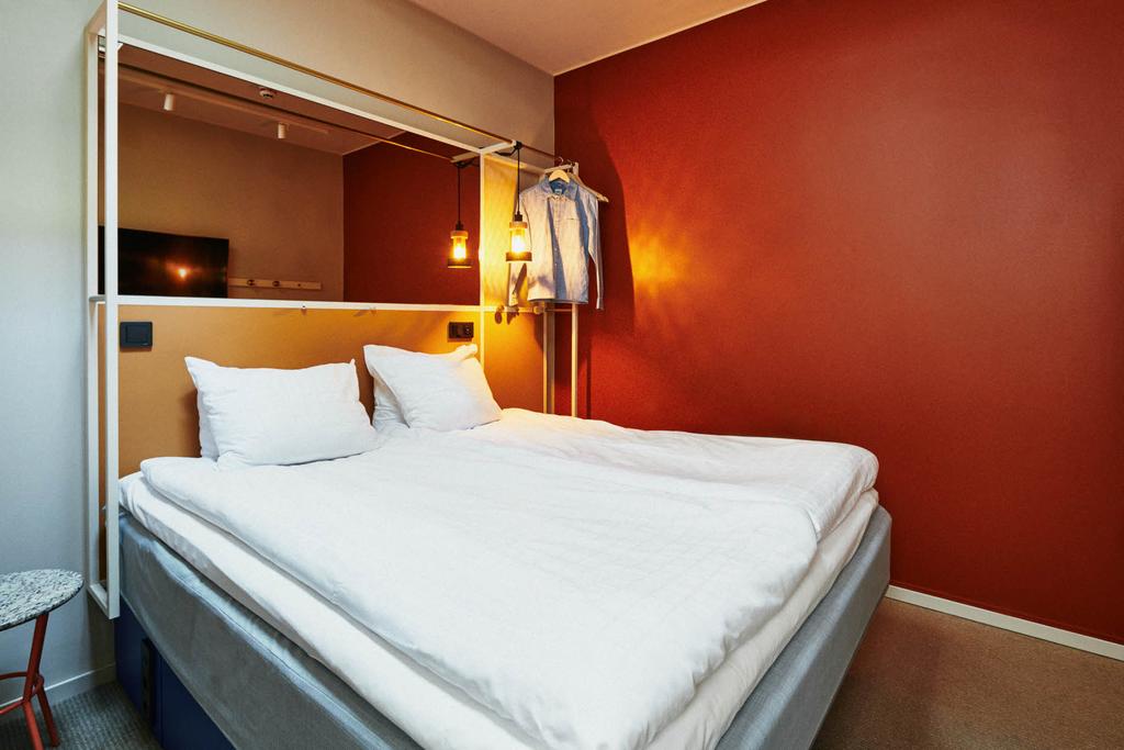 bed in double room at scandic go upplandsgatan in stockholm