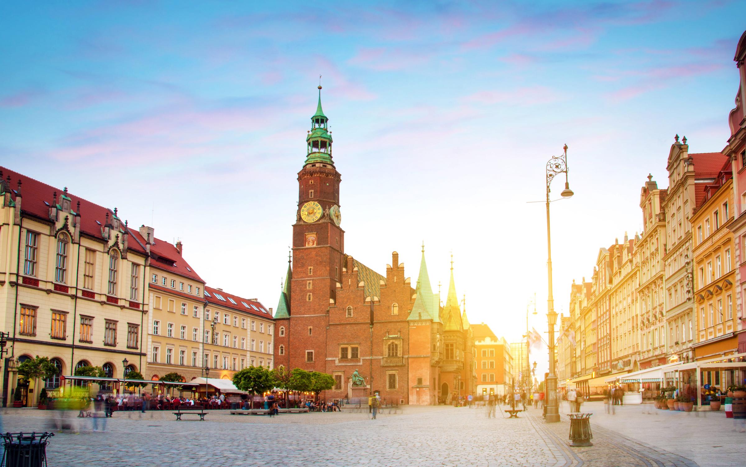 fantastic urban landscape with Town Hall on the medieval Market square in Wroclaw (capital of Silesia), Poland, Europe at sunset. 