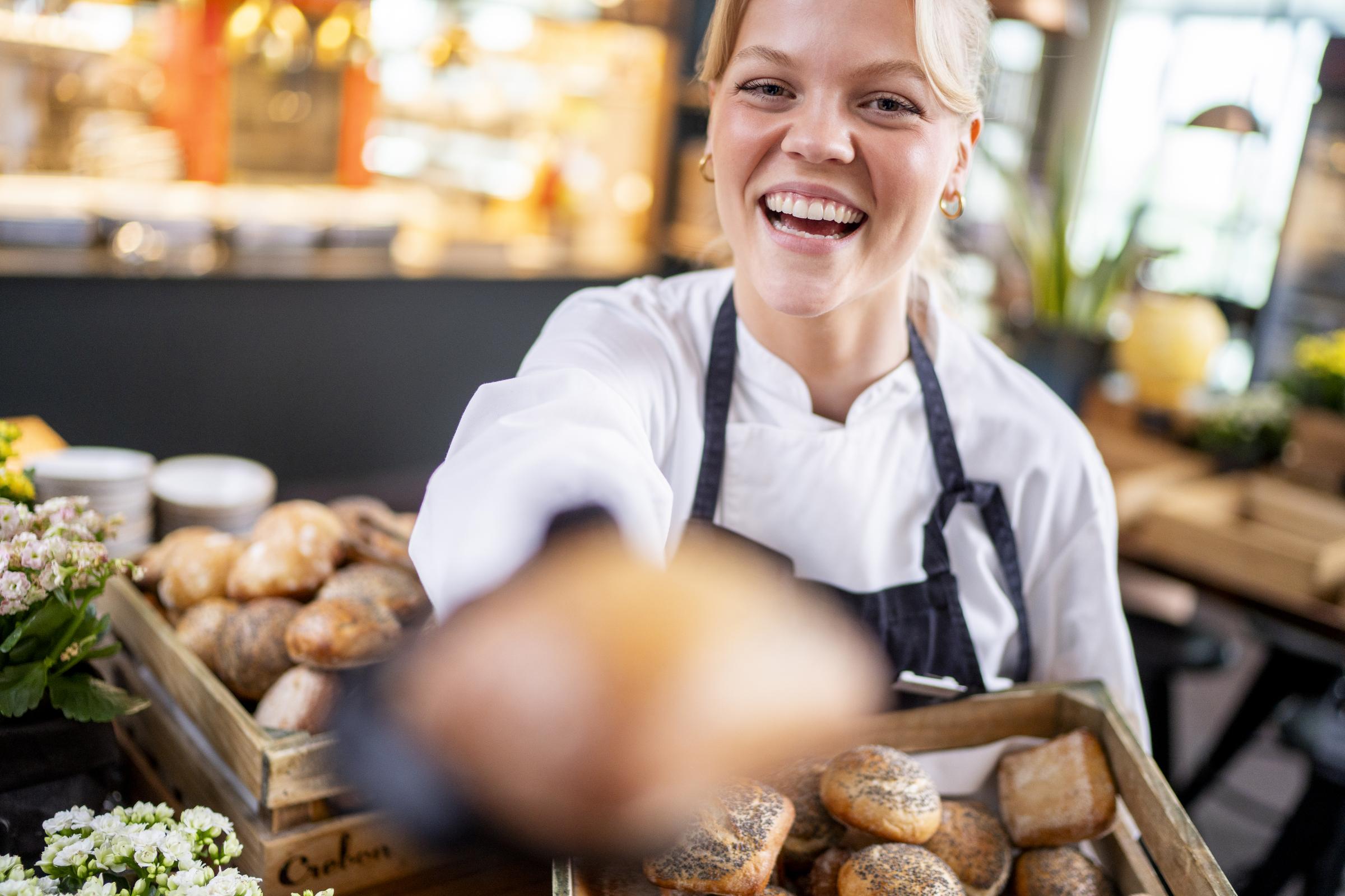 Team member preparing breakfast buffet