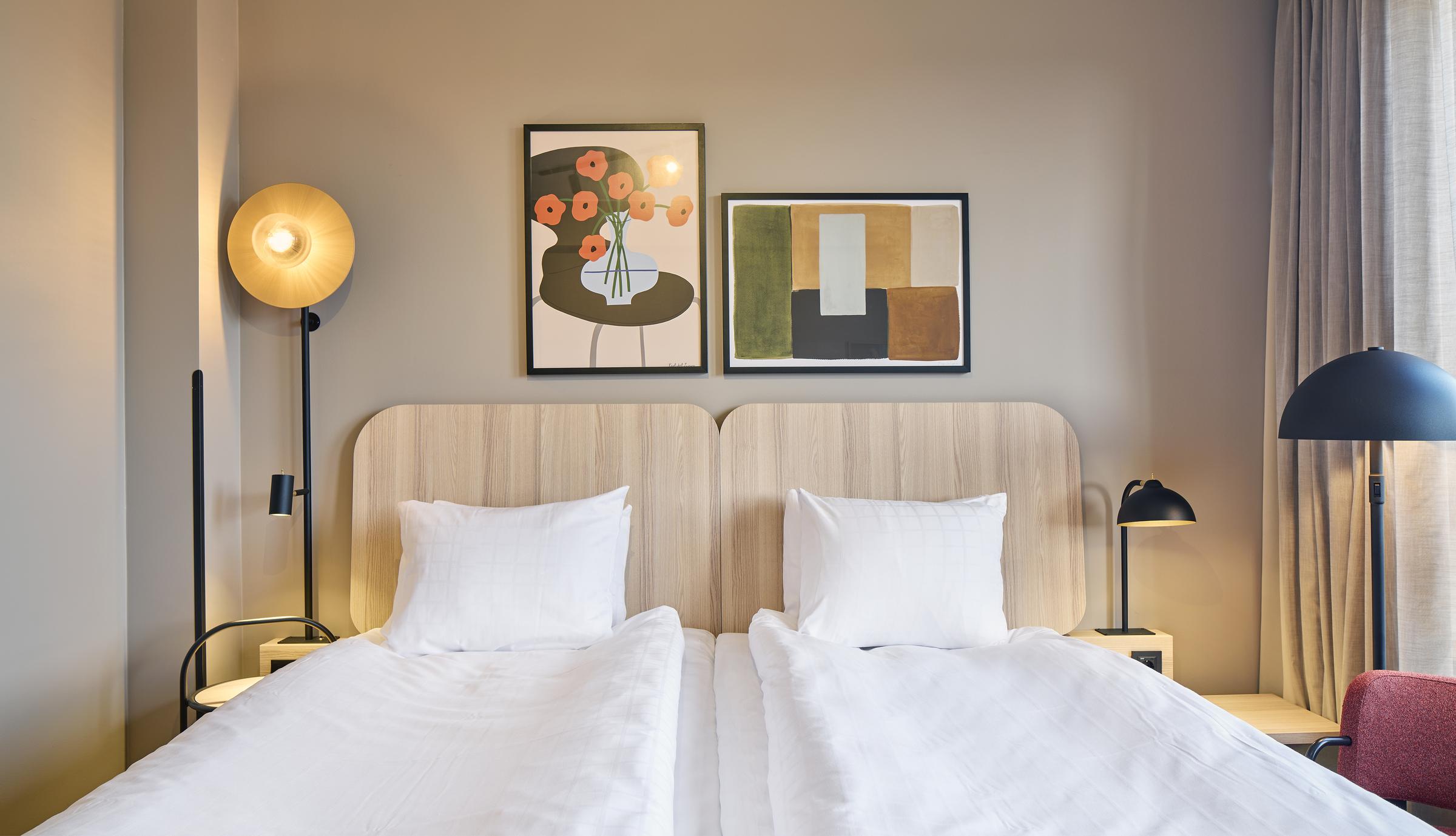 bed in superior room at scandic wallin in stockholm