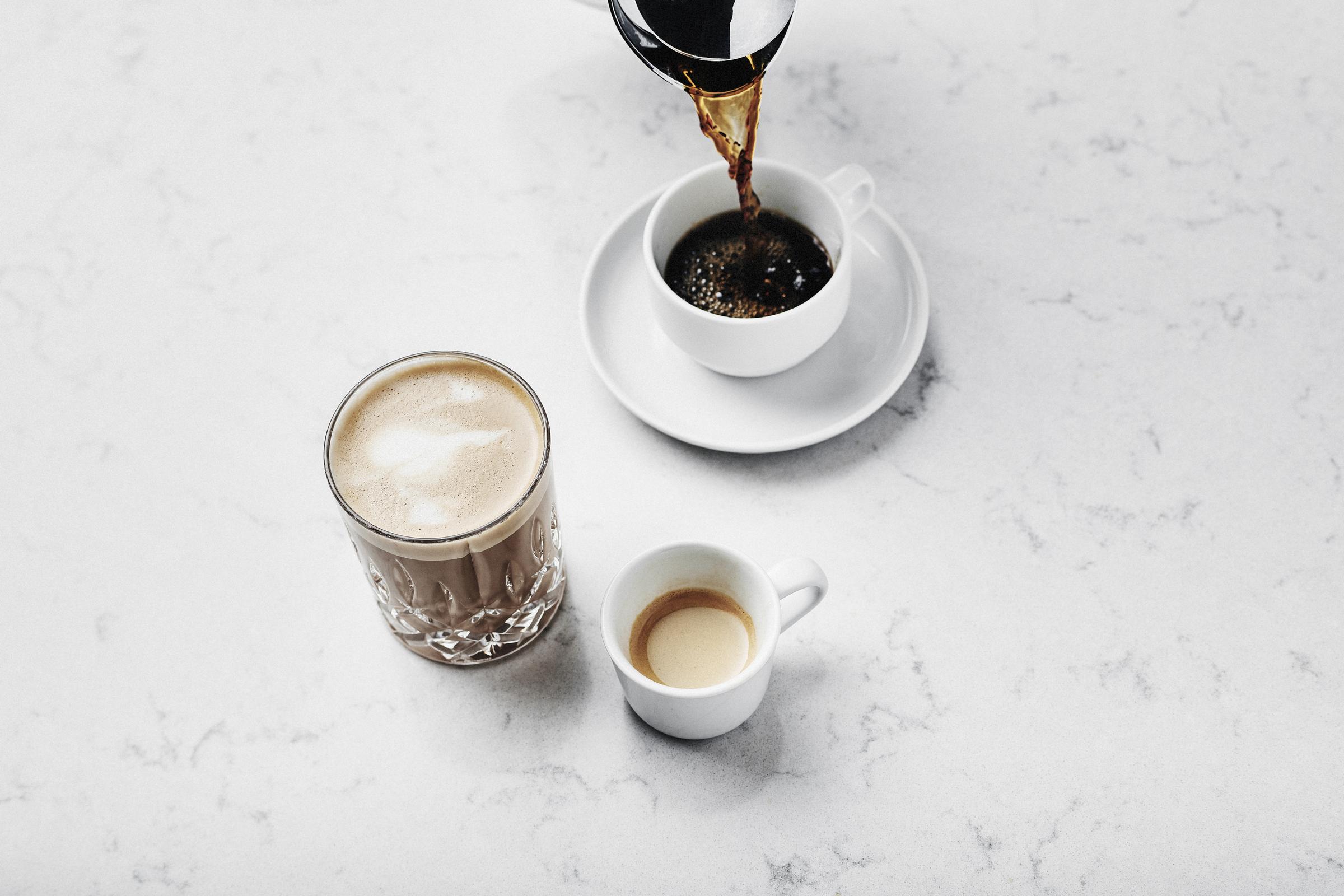 One cup of black coffee, one latte and one cup of espresso