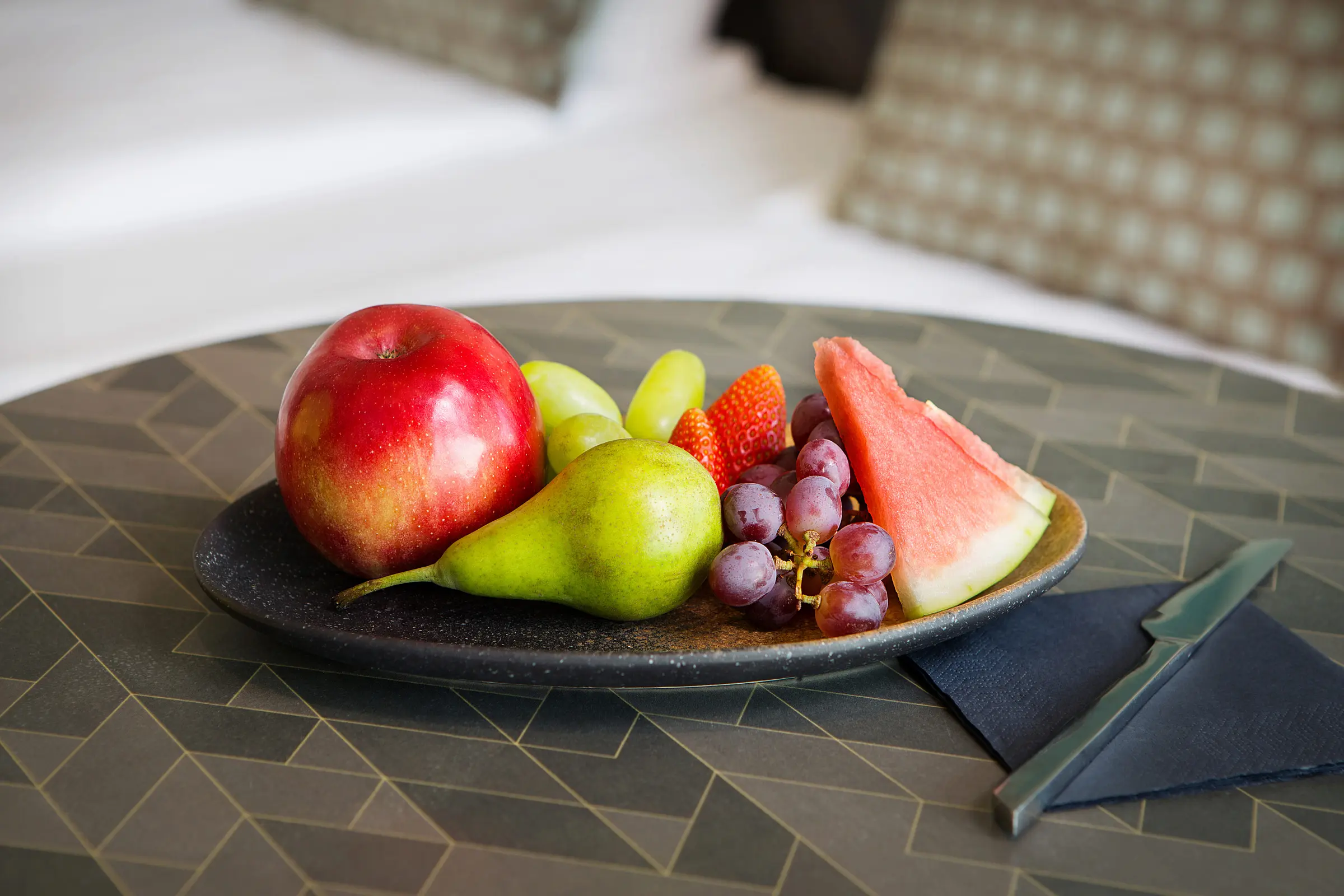 A plate with a choose of fruite