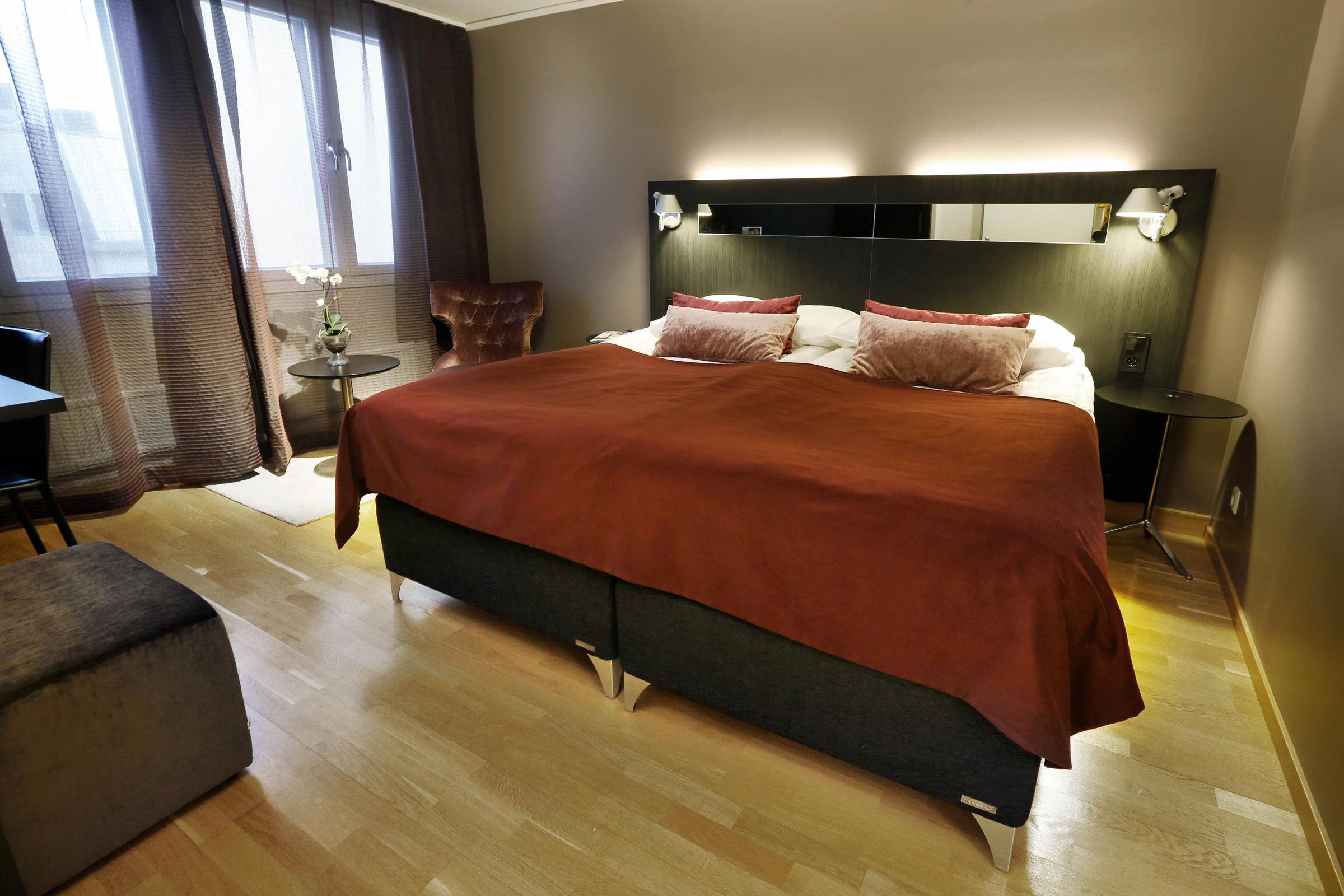 bed in superior room at scandic uplandia in uppsala