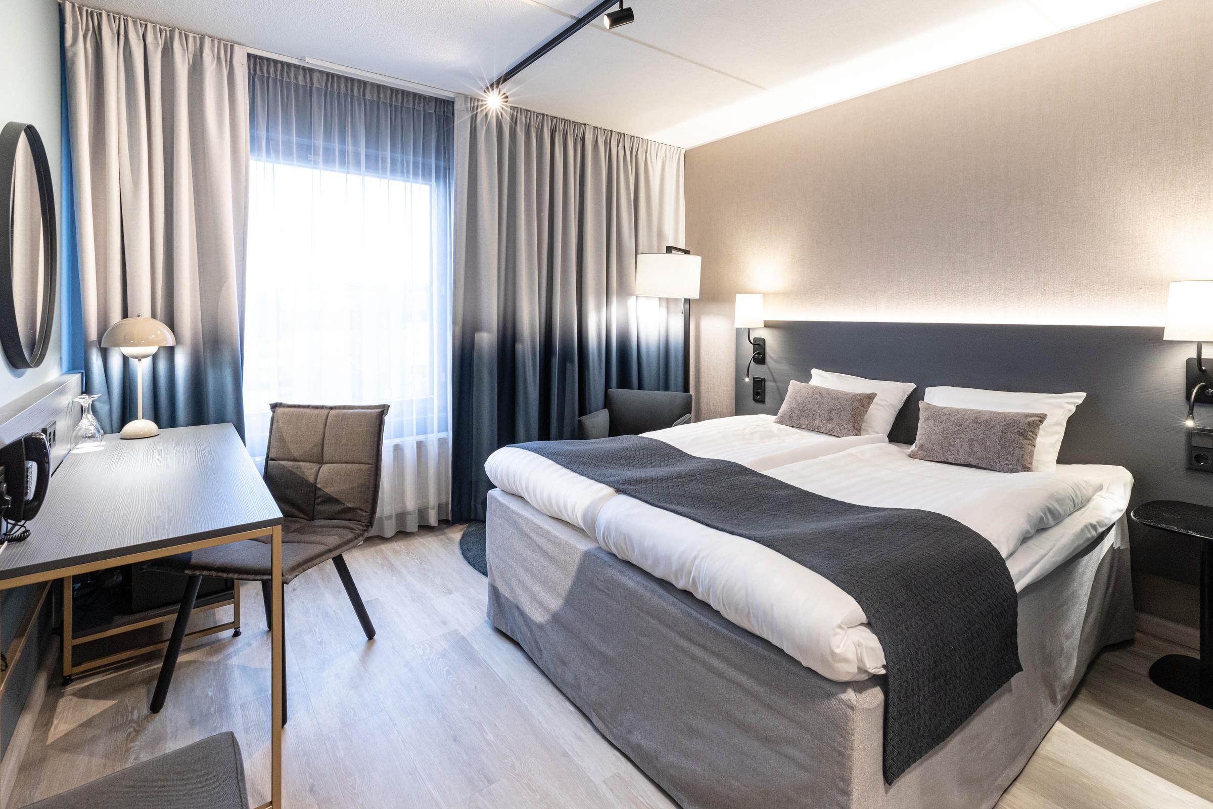 room standard queen at scandic jyvaskyla station in finland