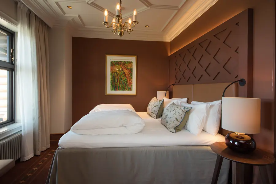 bedding in drage suite at scandic holmenkollen park in oslo