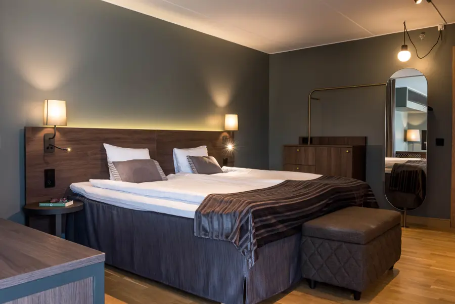Bed in room Presidential Suite