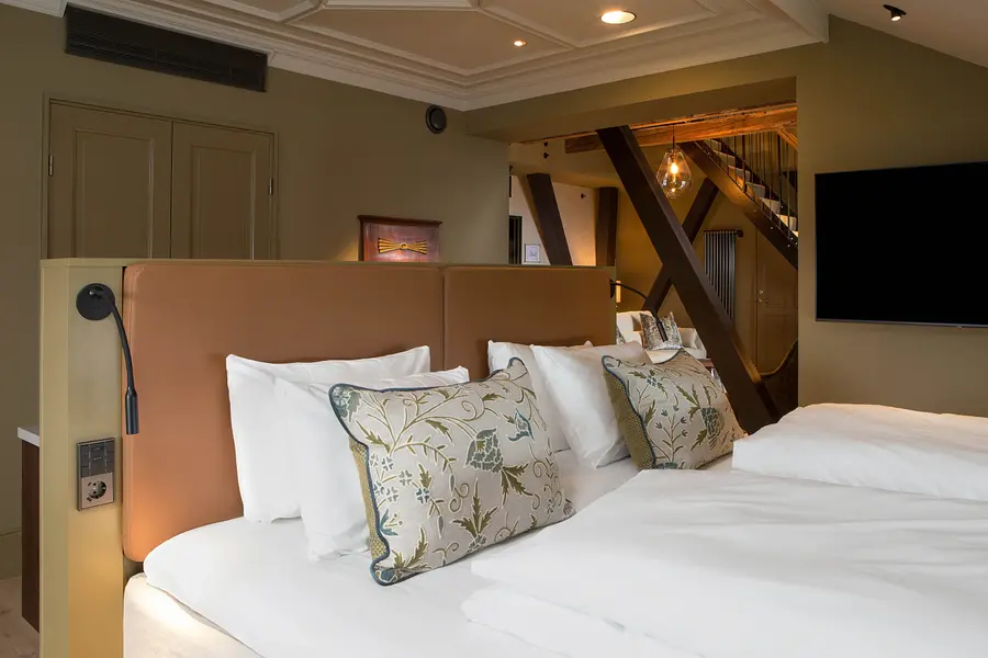 bedding in tårn suite at scandic holmenkollen park in oslo