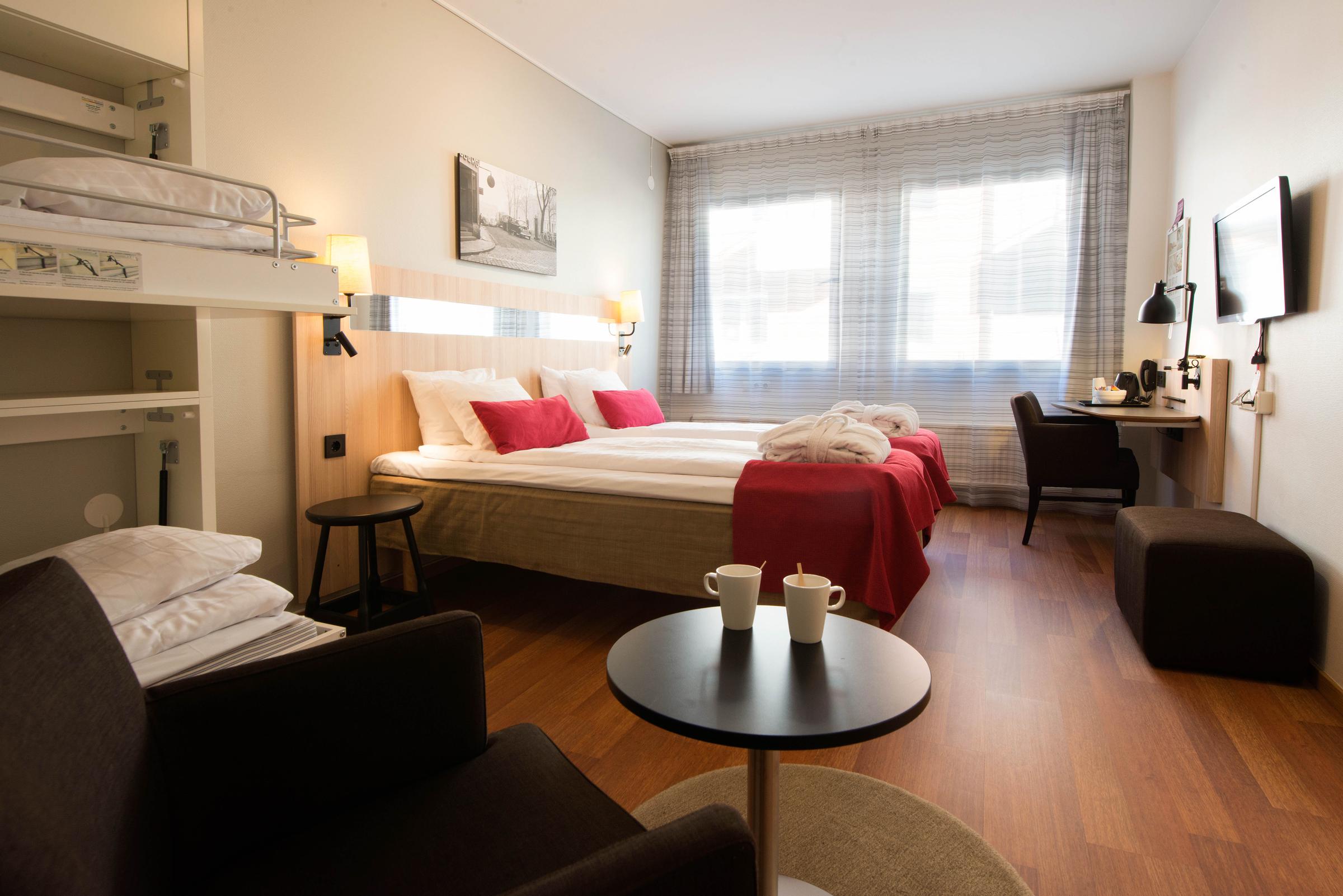 Beds and bunkbed in Standard Family Four room at Scandic Sundsvall City
