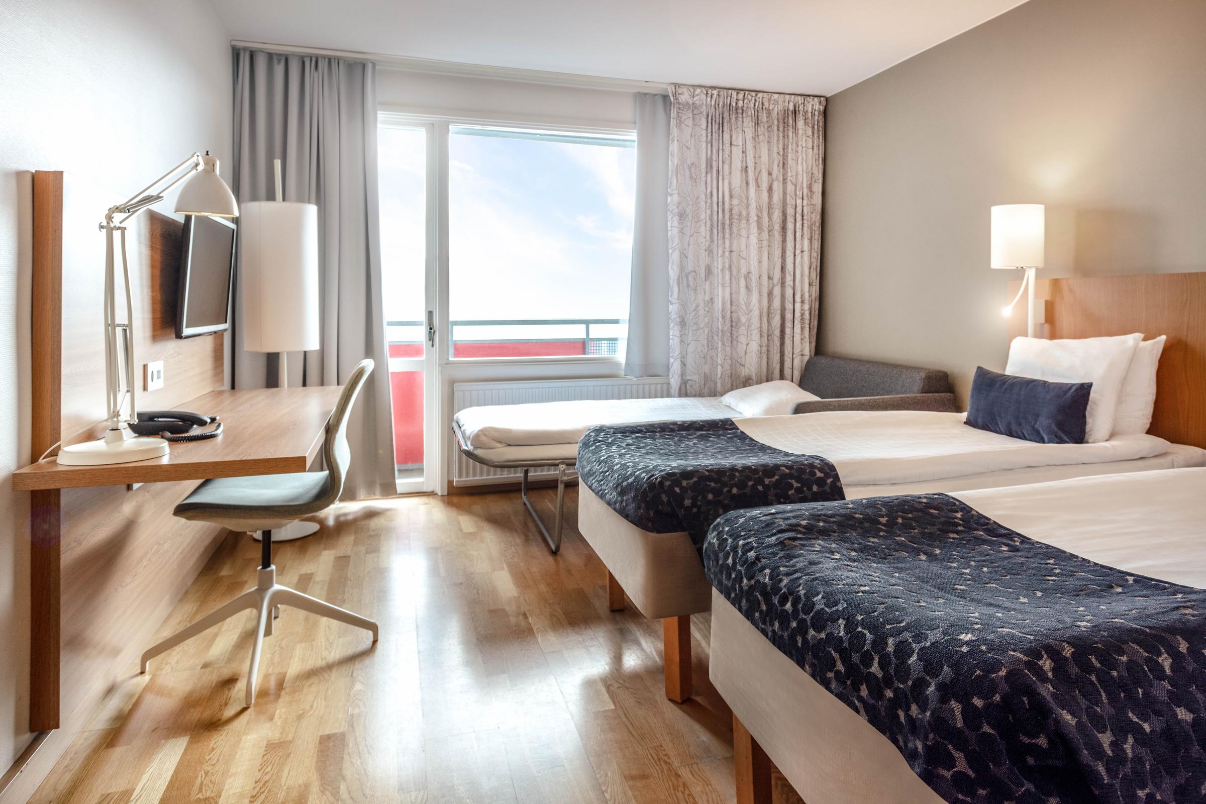three beds in family room at scandic elmia in jönköping