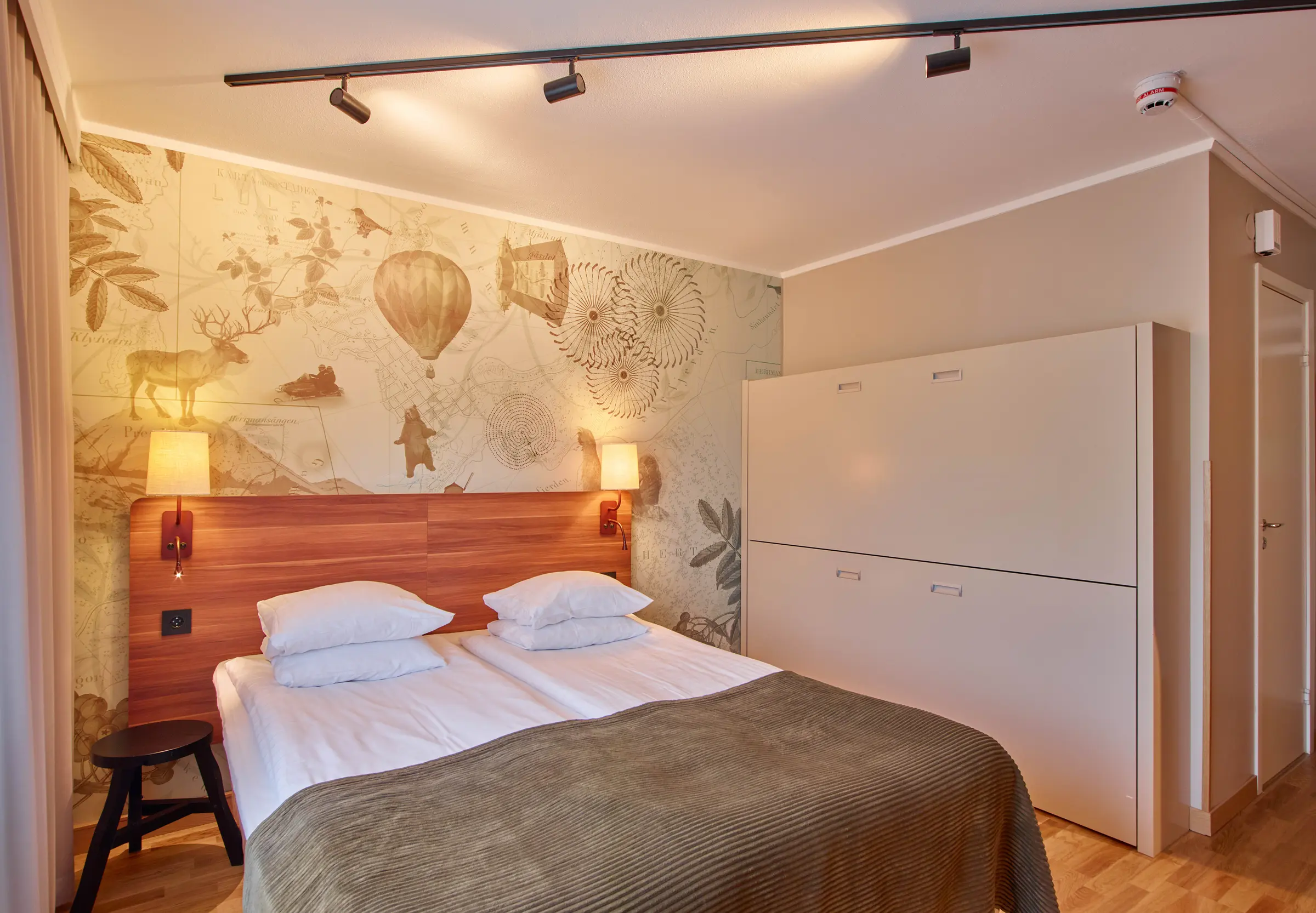 Bed in Standard family room at Scandic Luleå