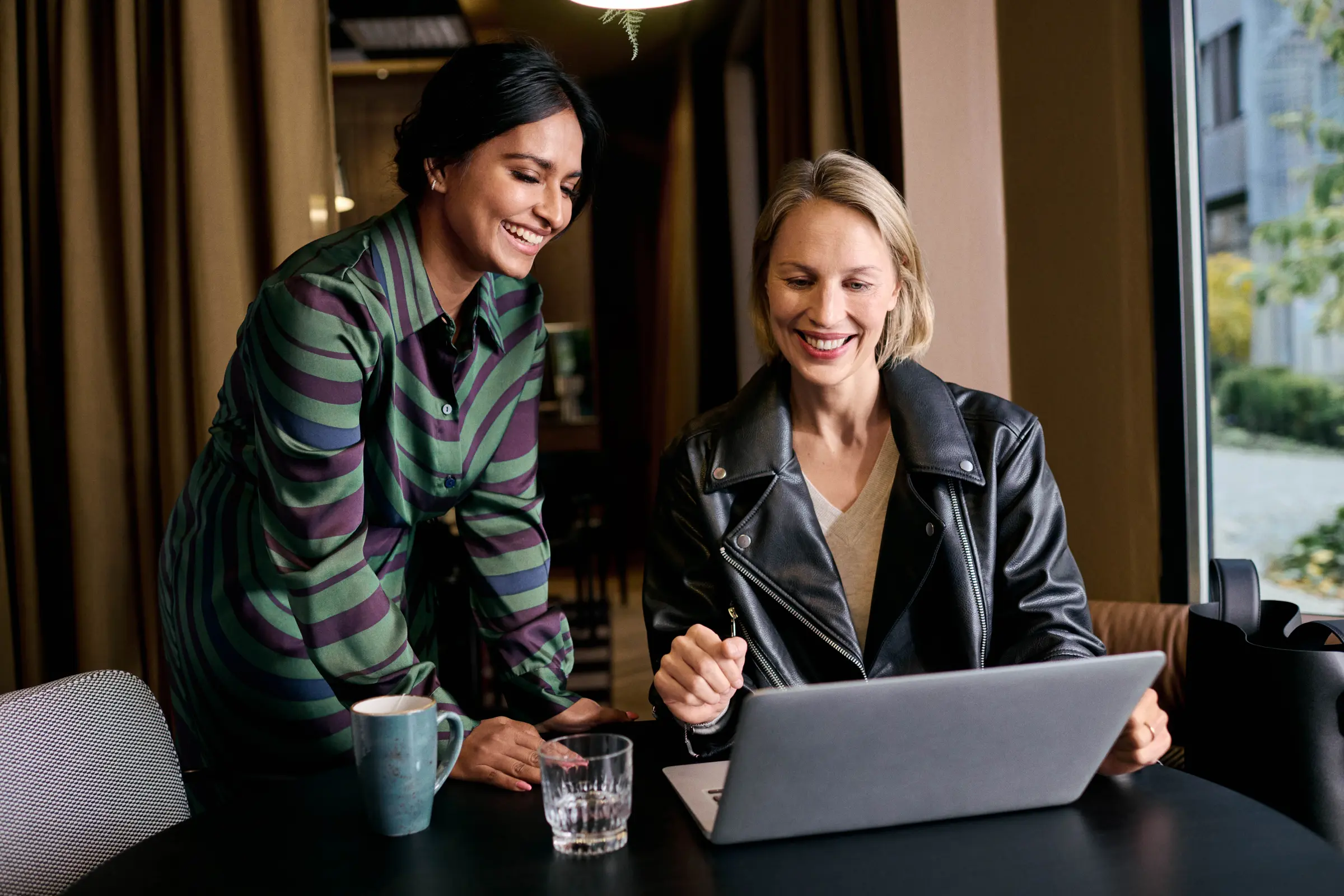 Two women are coworking