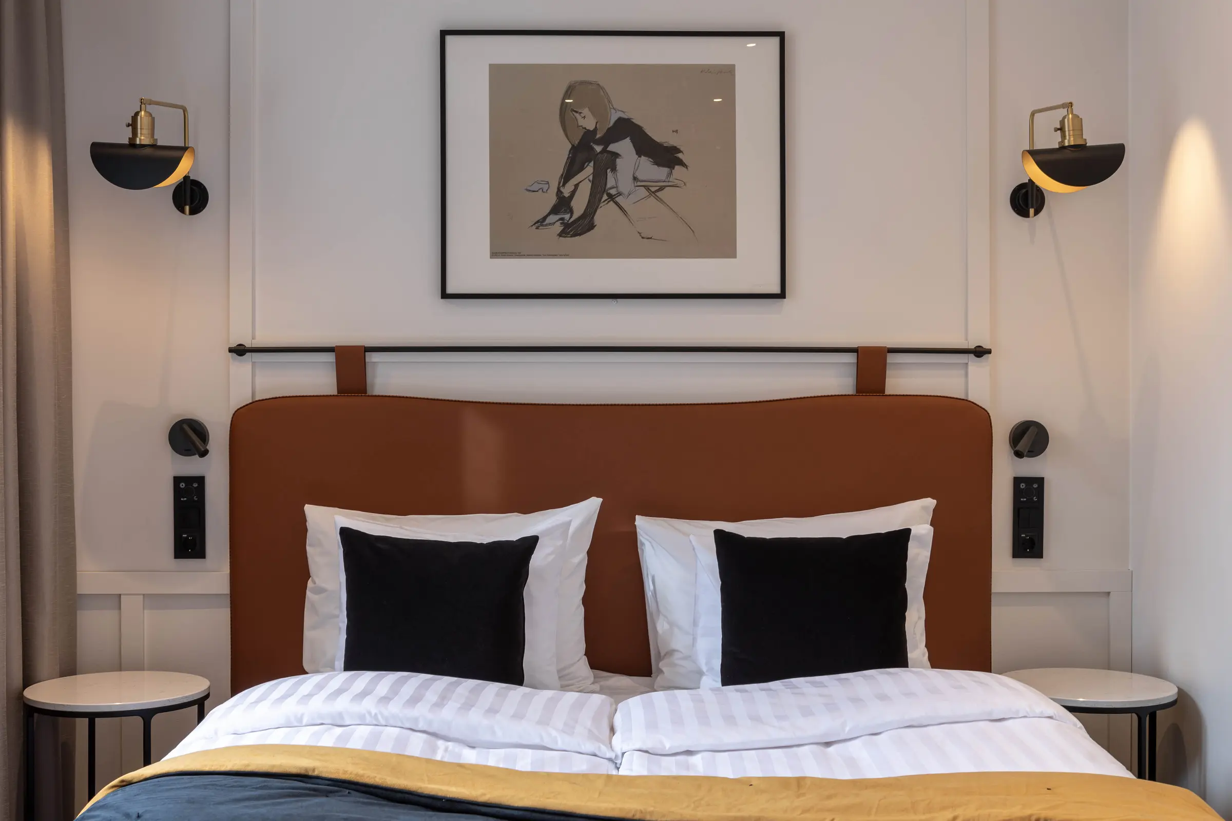 bed in superior room at scandic grand central helsinki
