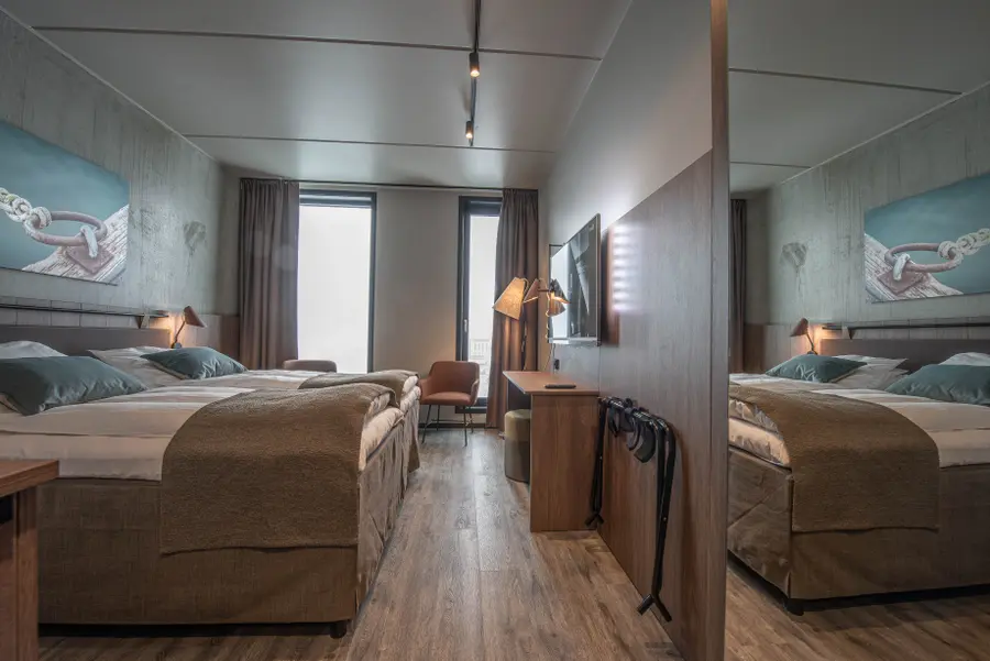 bed in standard room at scandic sortland