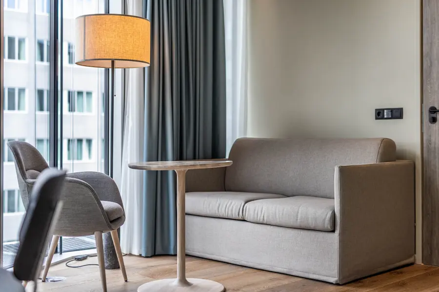 sitting area junior suite room at scandic spectrum