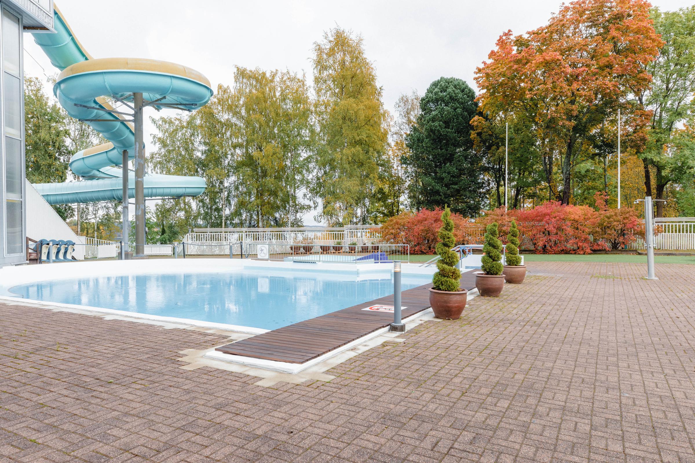 outdoor pool and water slide at scandic eden nokia