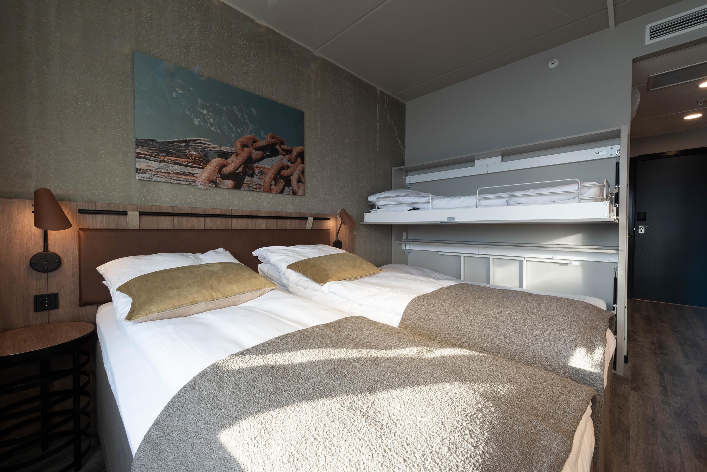 bed and bunk bed in family room at scandic sortland