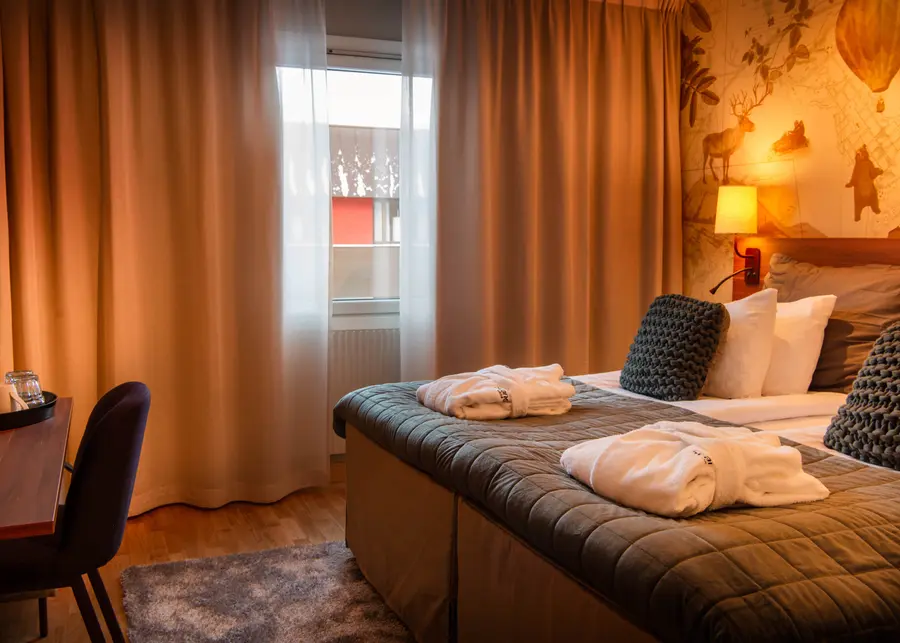 Beds in a Junior suite at Scandic Luleå