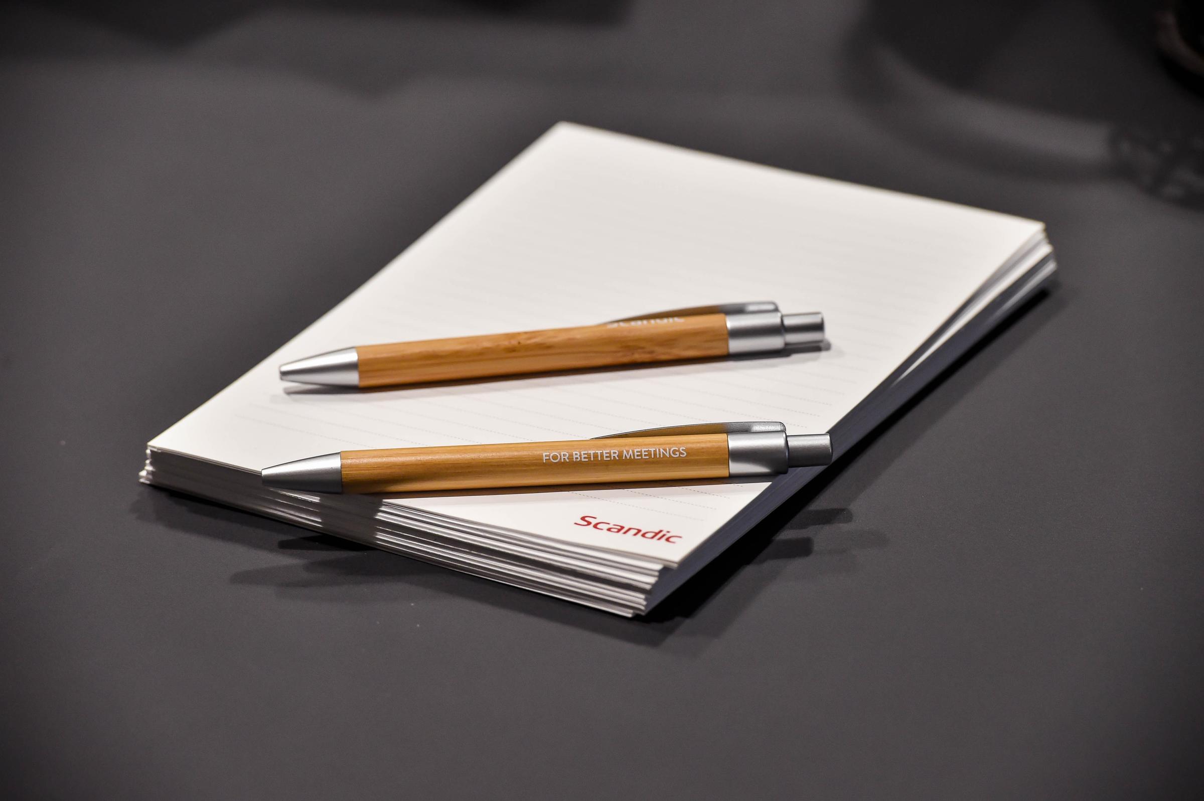 Pen and paper in meeting room