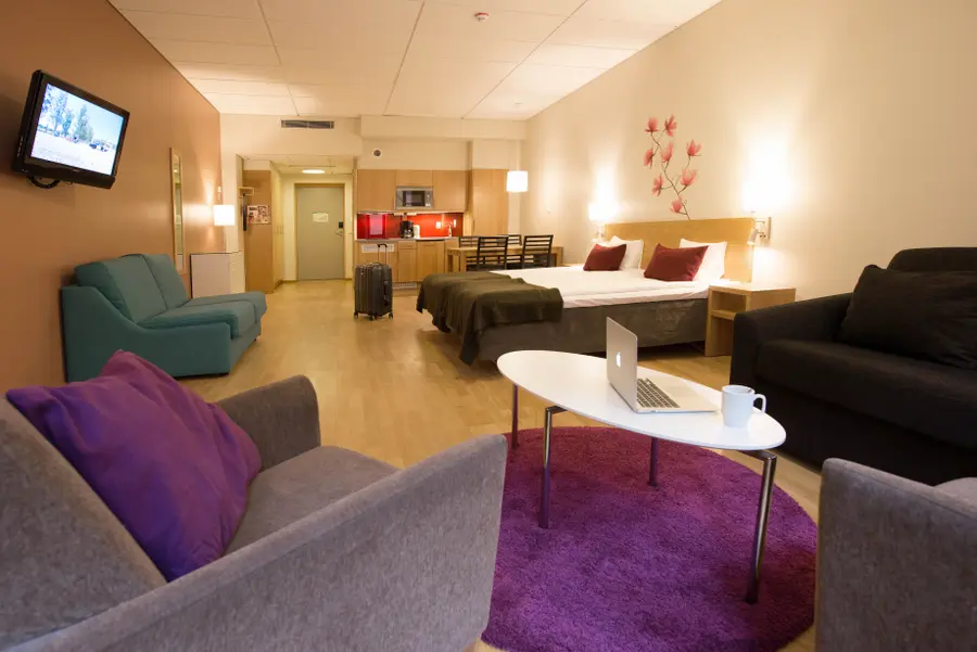 Overlooking a Family Five Kitchenette room with livingroom at Scandic Malmö City