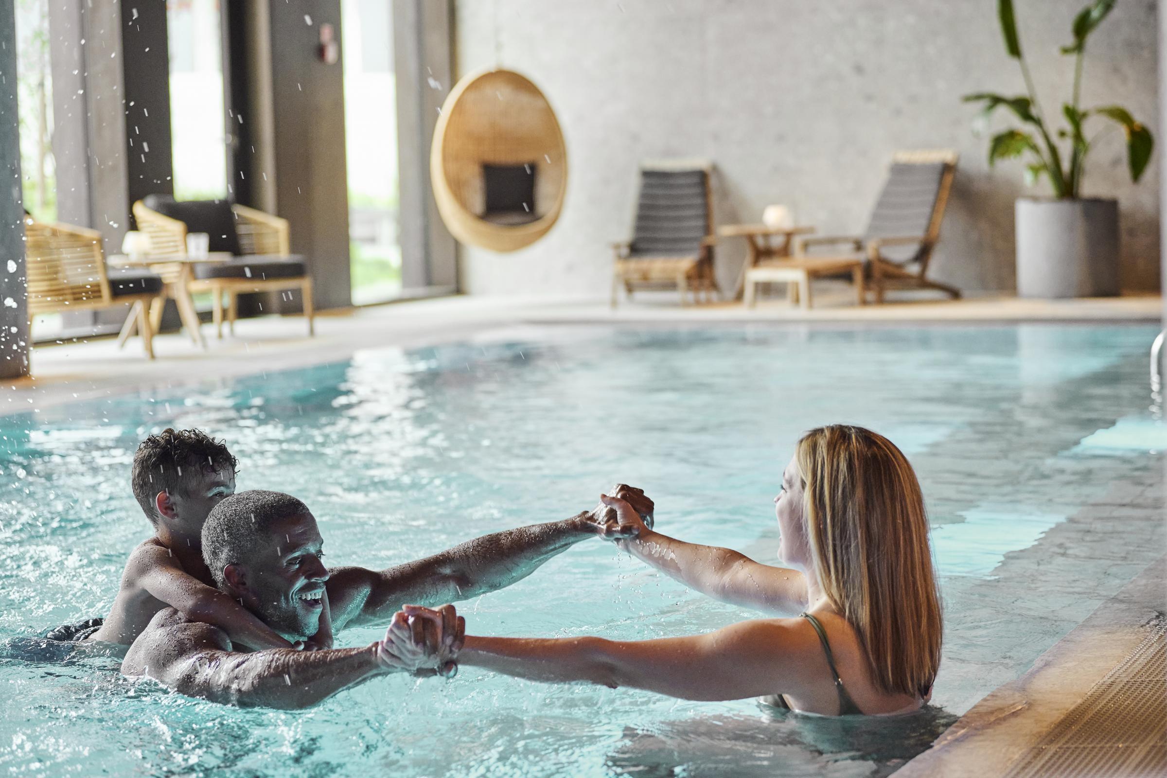 Family in wellness pool