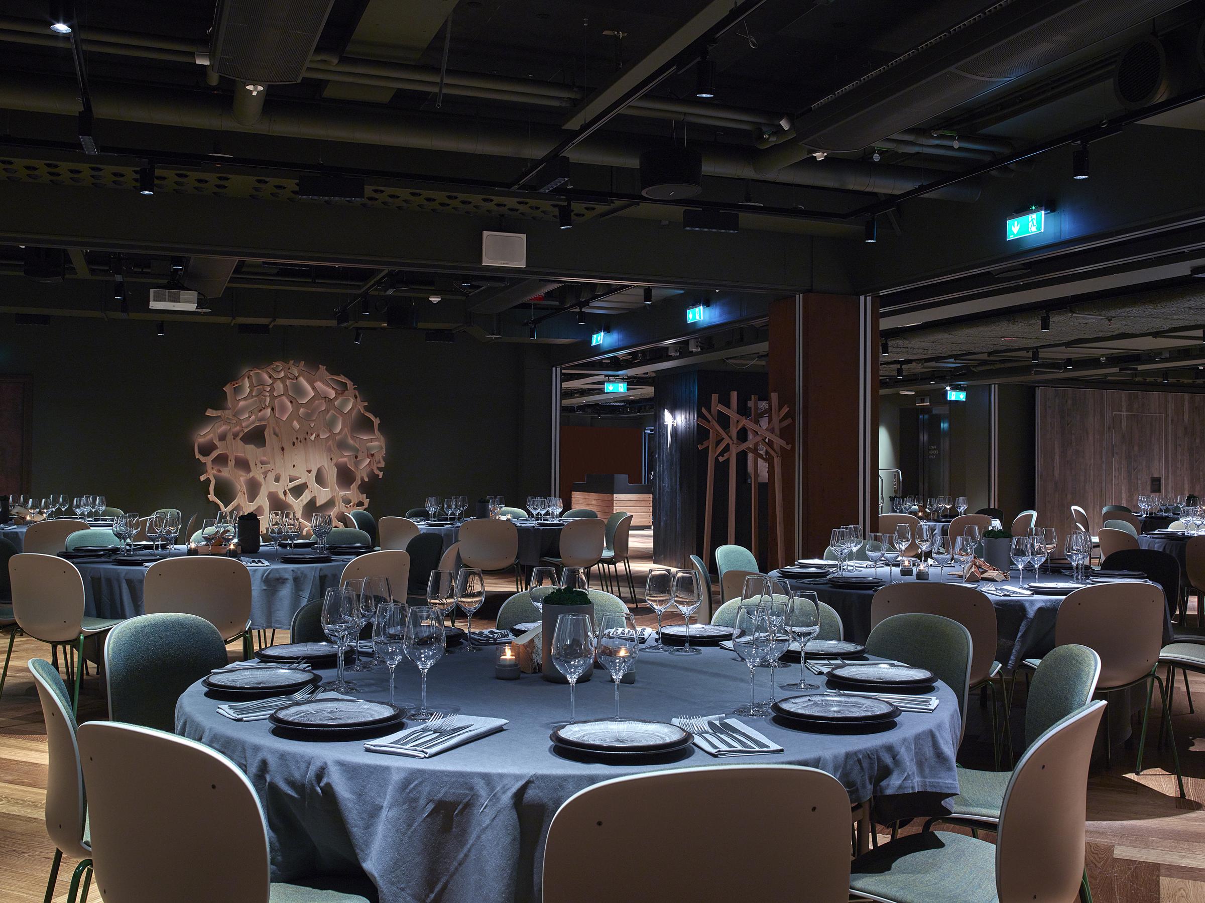 dinner setting at roots of downtown camper by scandic in stockholm
