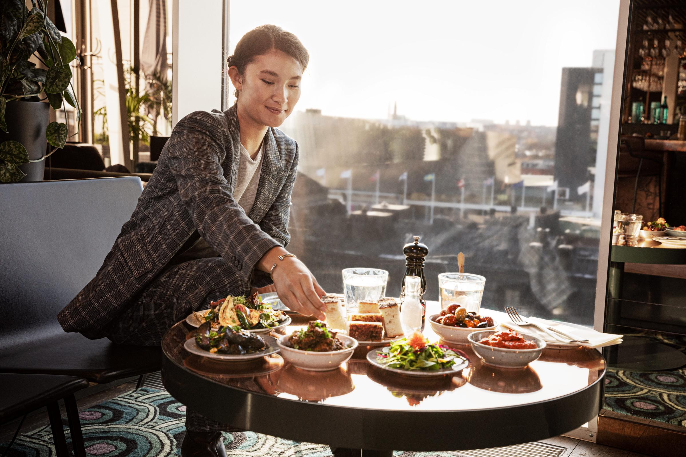 woman eating meeting lunch at scandic hotels
