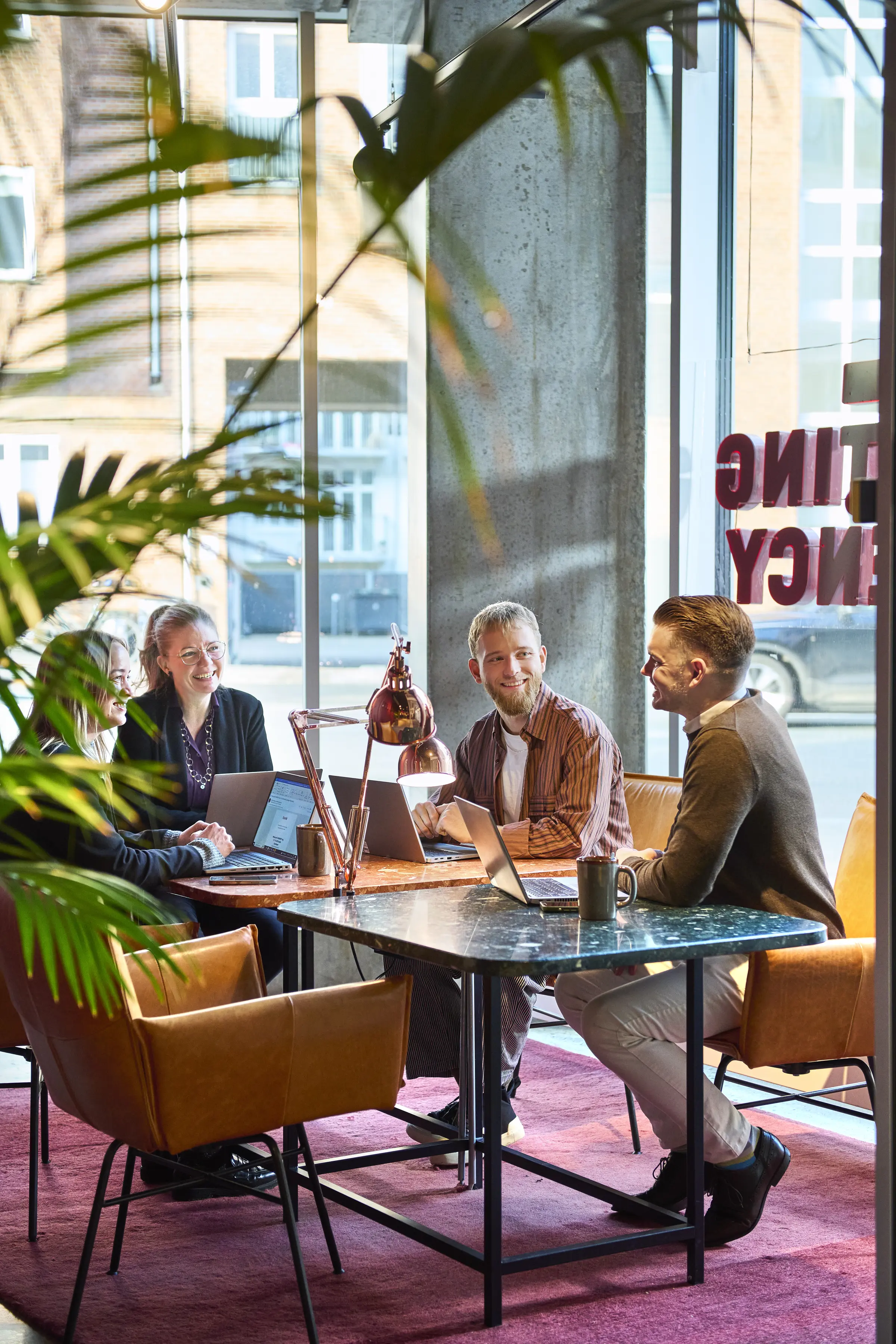 Group of people having a meeting in a lobby