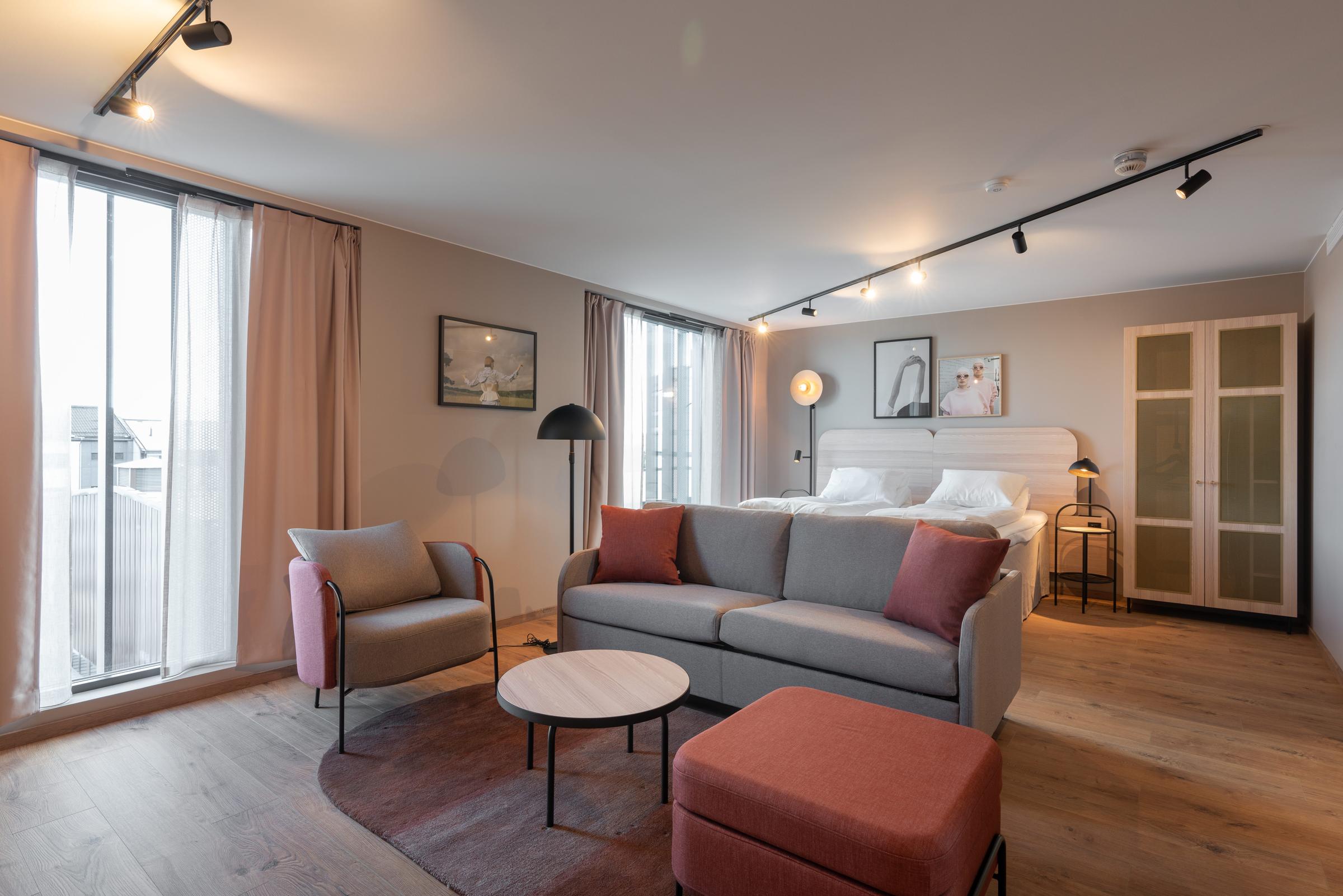 Seating area in suite at Scandic Hamar