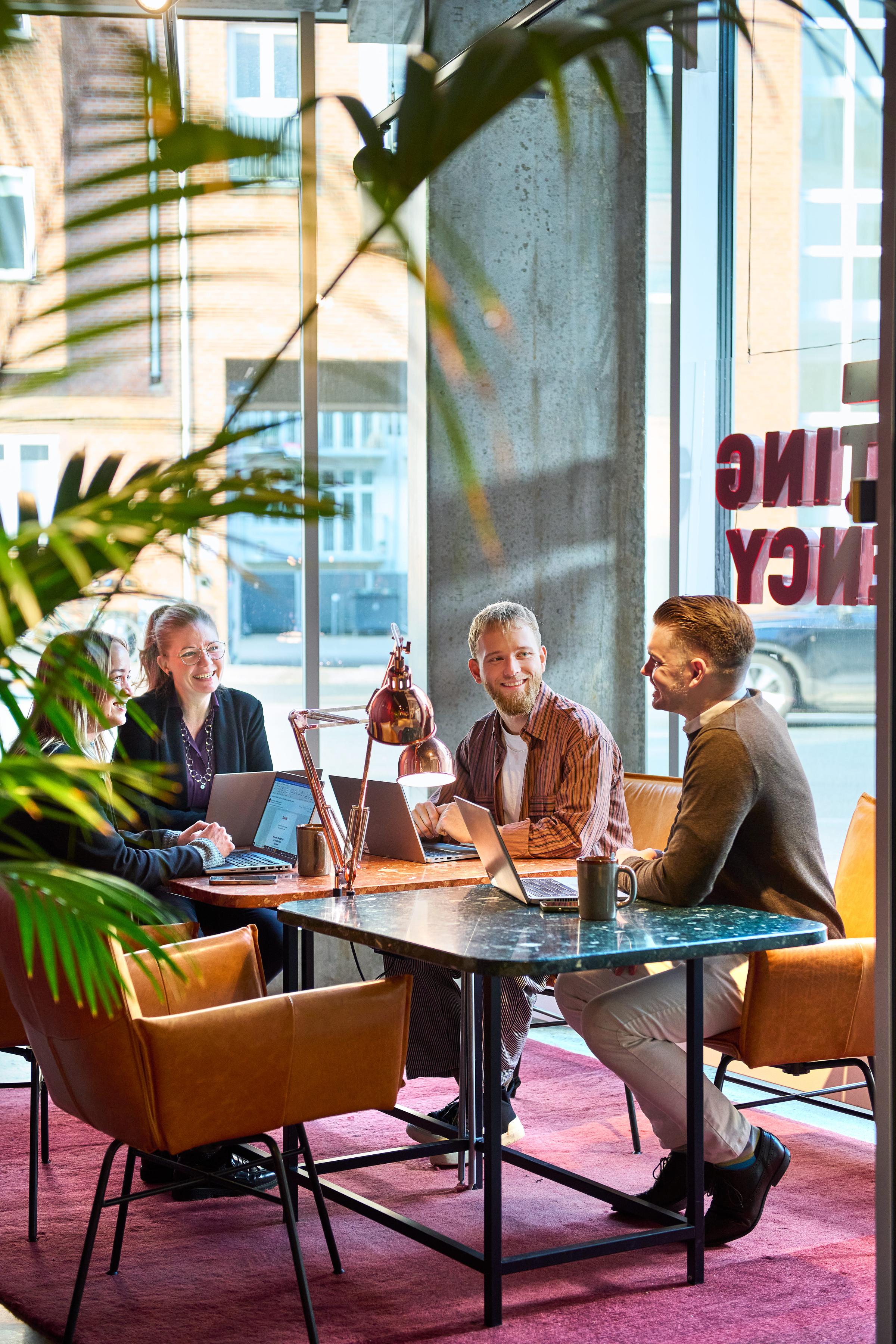 Group of people having a meeting in a lobby