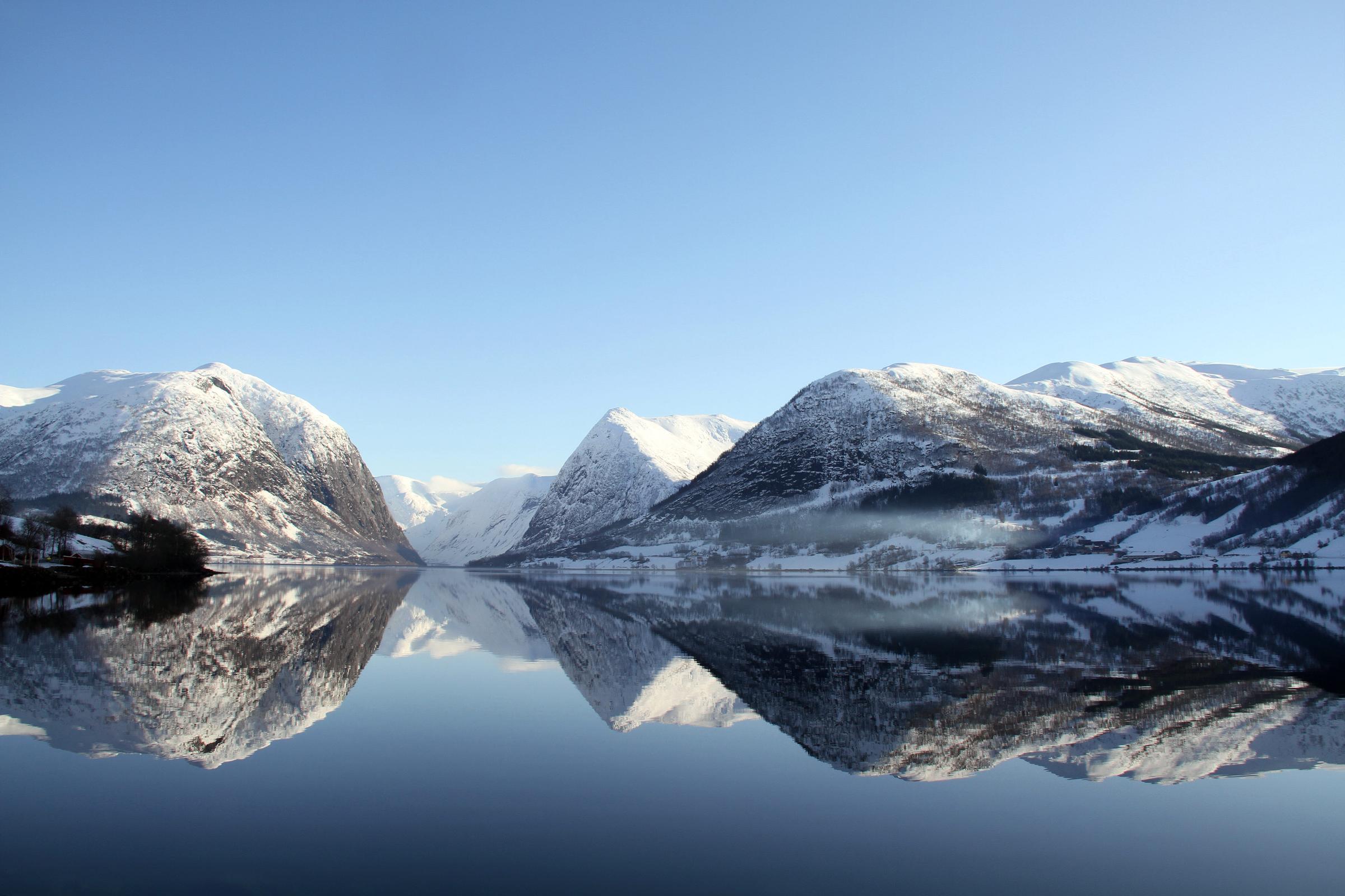 Lake reflection of Jølstravatn in Norway once in winterly February