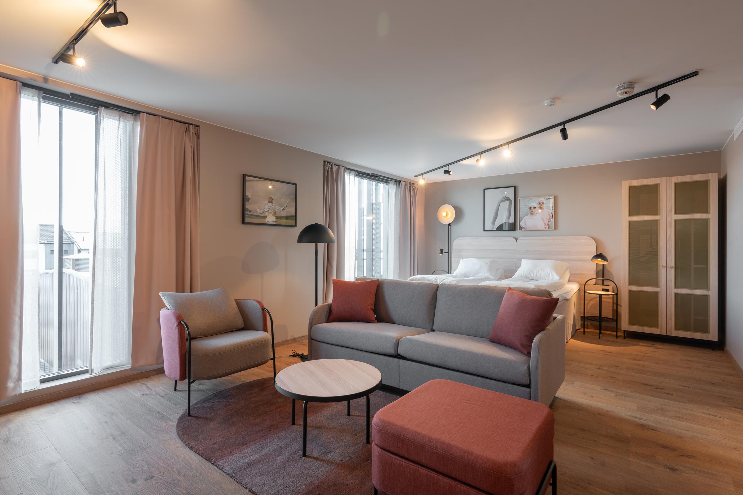 Seating area in suite at Scandic Hamar