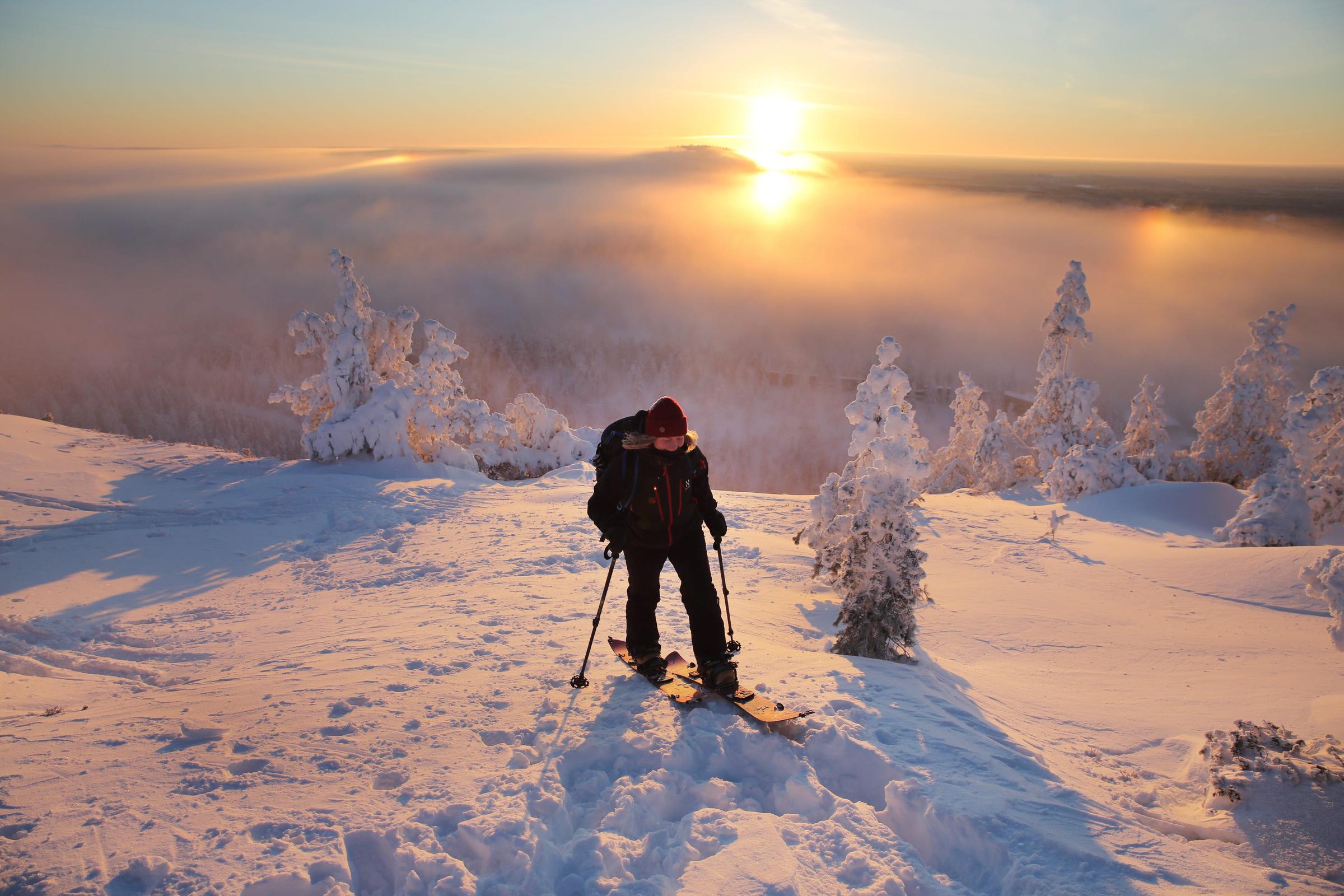 Backcountry skiing during sunset, Ruka Ski Resort
