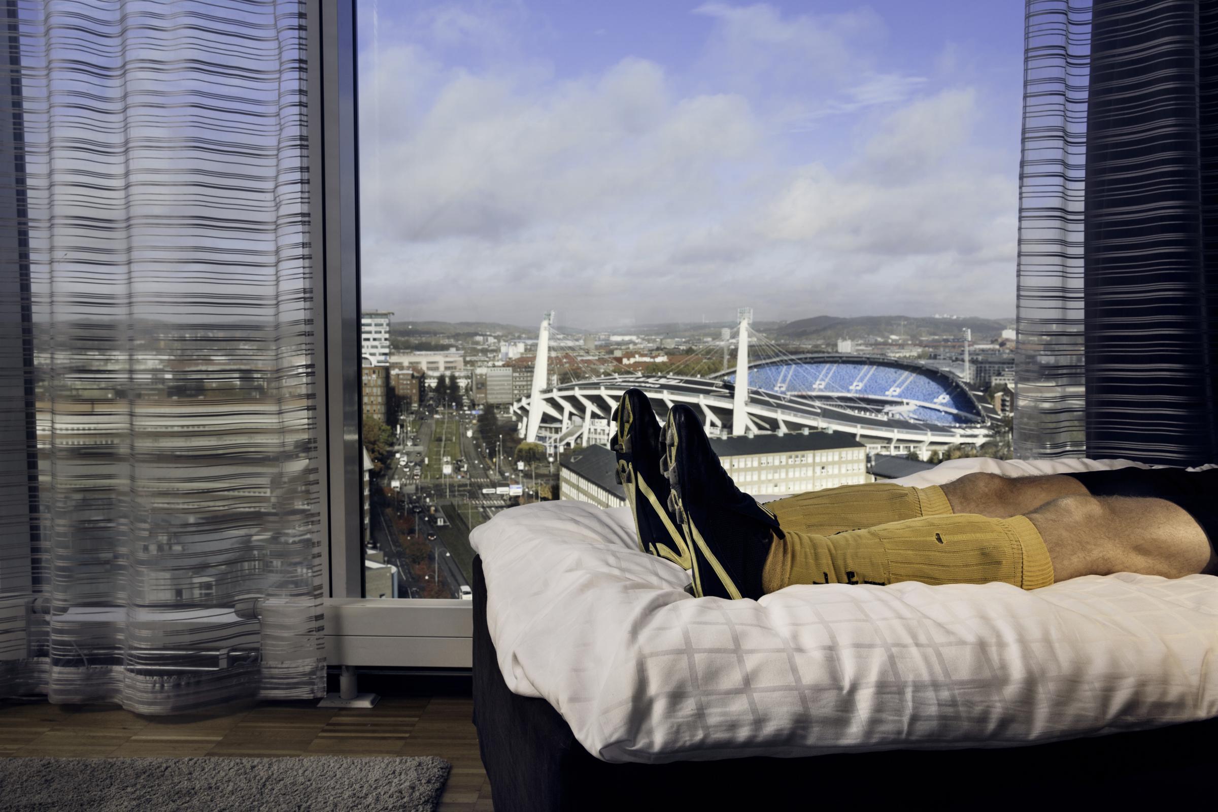 Soccer player in bed