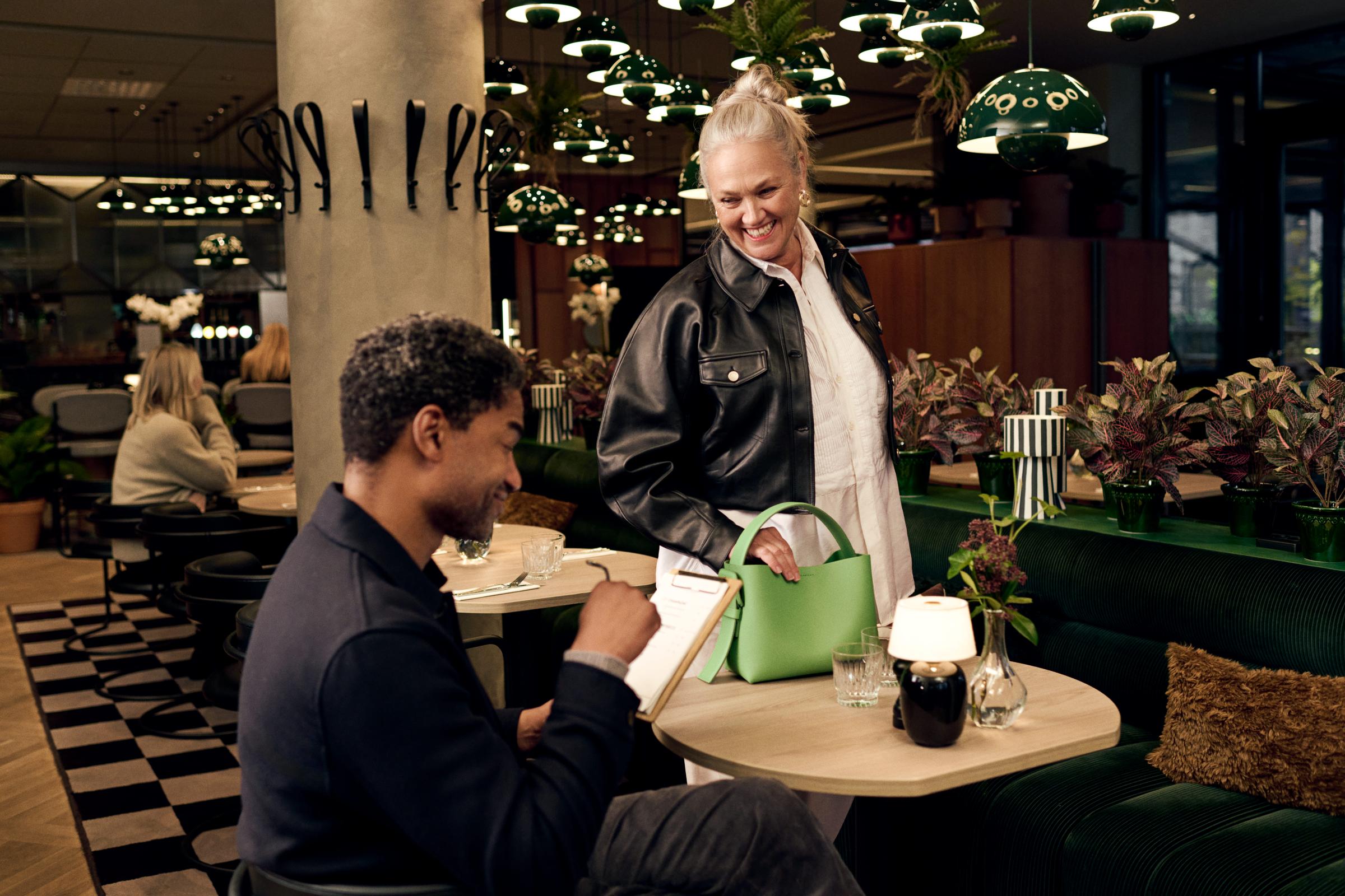 A senior couple in a bar
